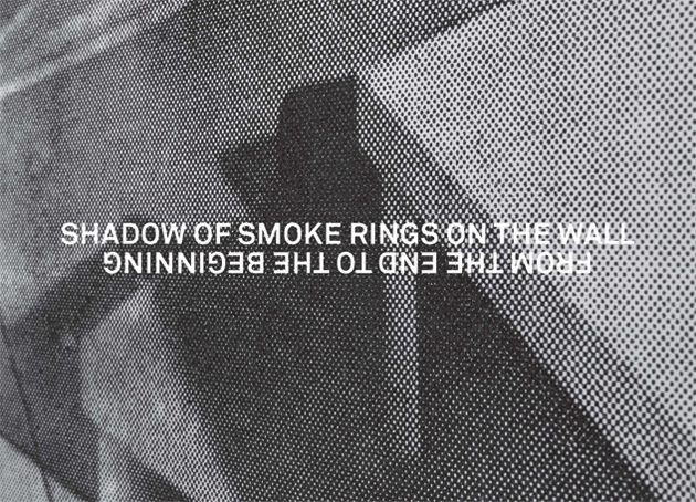 SHADOW OF SMOKE RINGS ON THE WALL